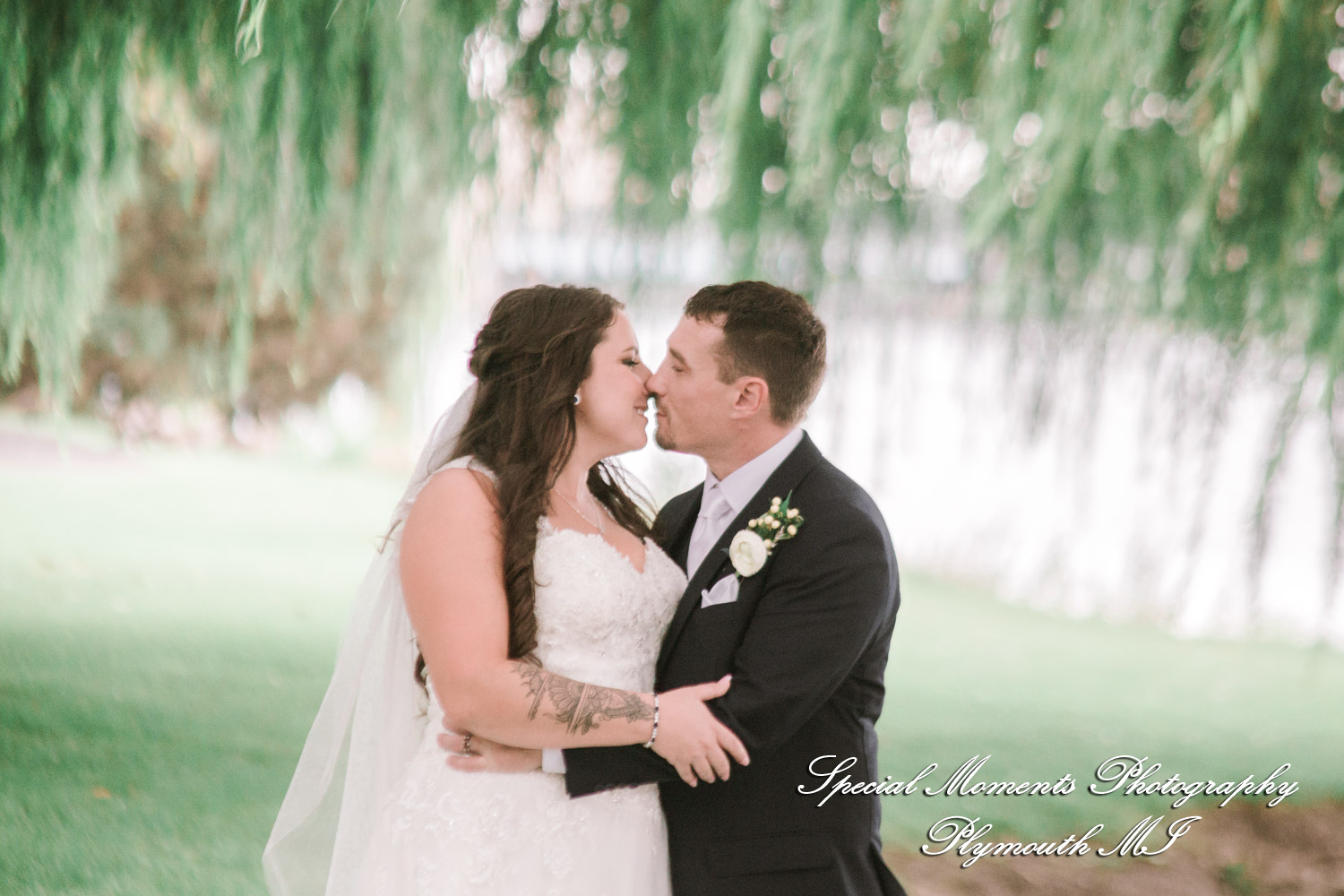 Ariana & Jeffrey DoubleTree Hilton Hotel Bay City MI wedding photography