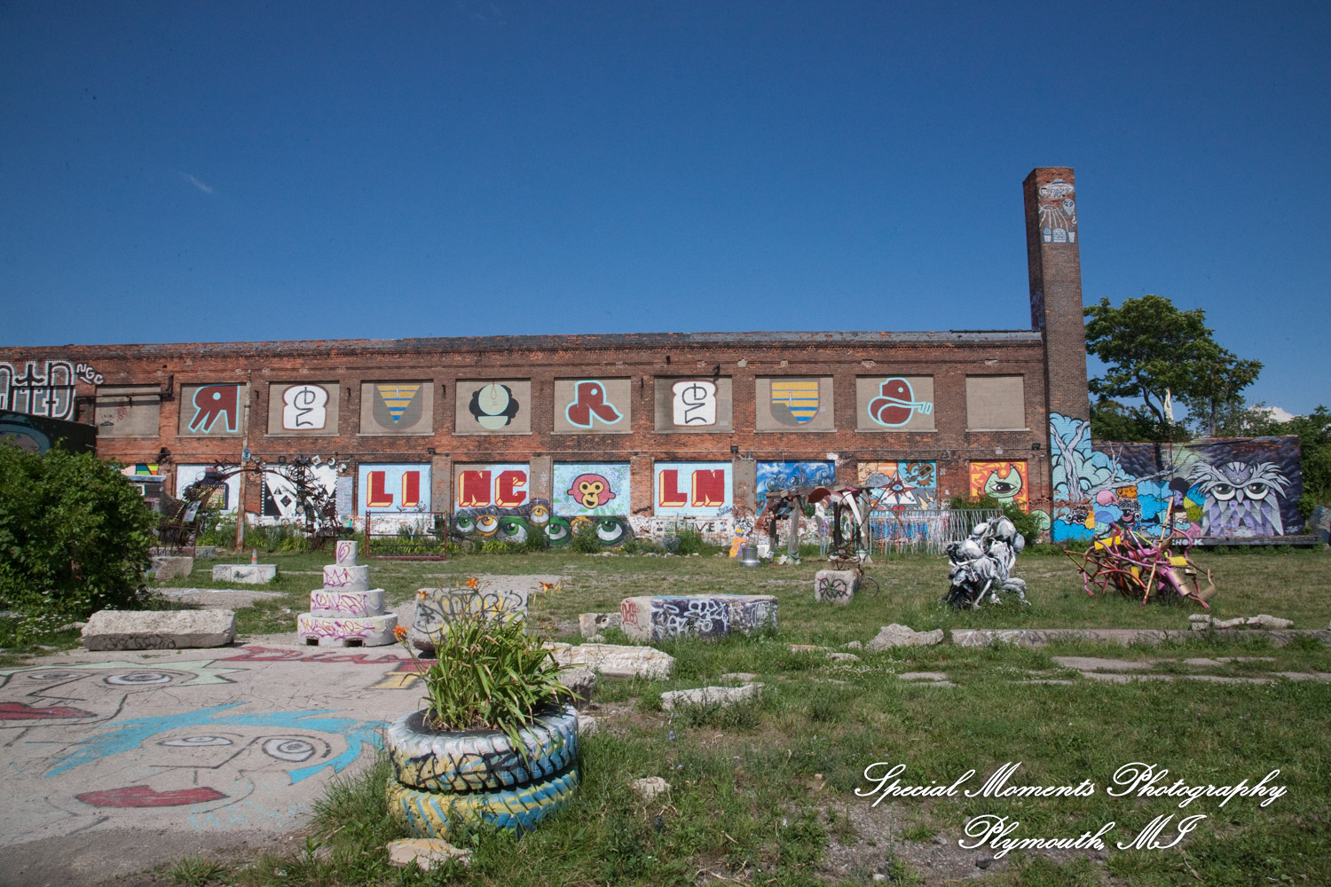Kelly & Ryan at Lincoln Street Art Project Detroit MI wedding photograph