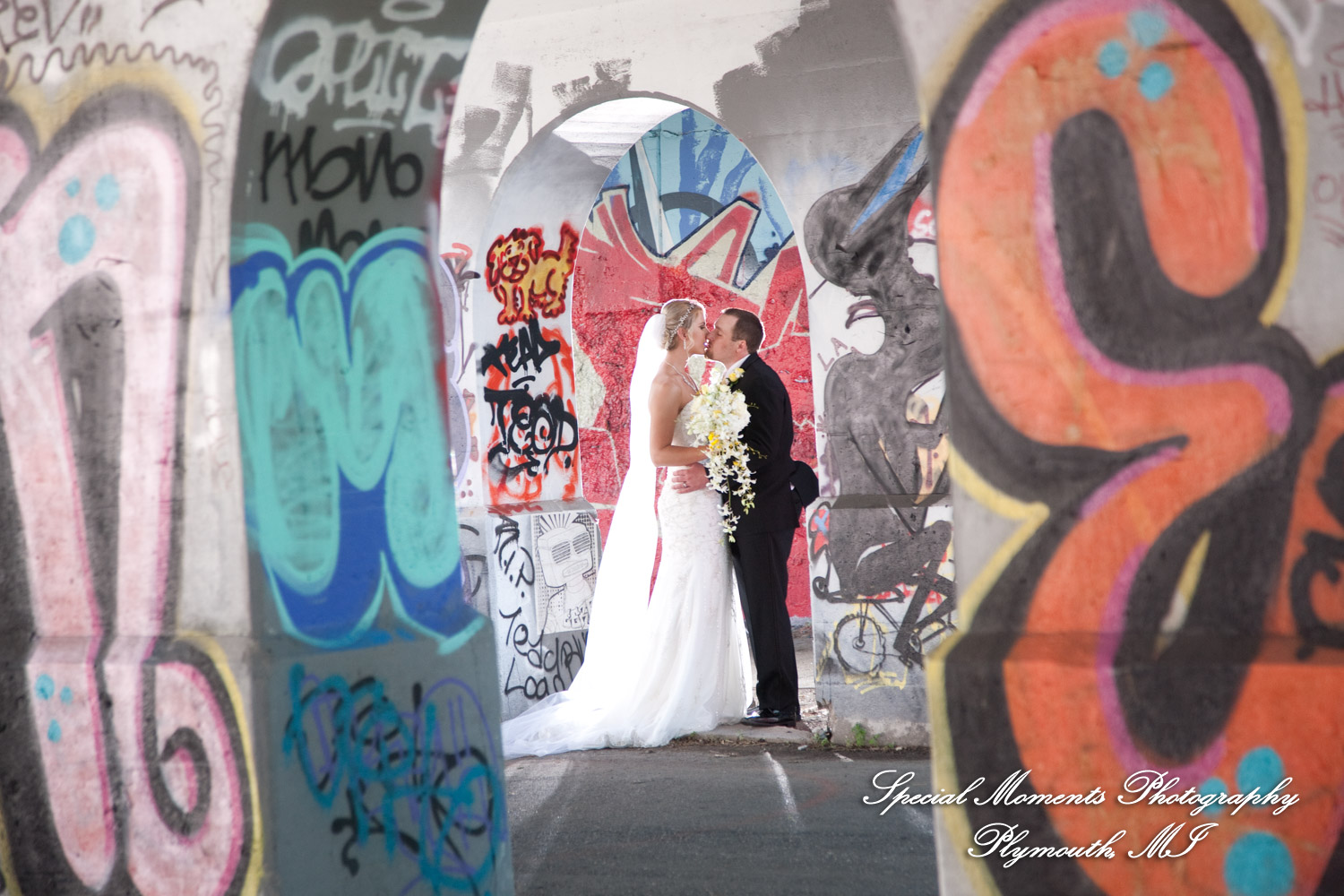 Kelly & Ryan at Lincoln Street Art Project Detroit MI wedding photograph