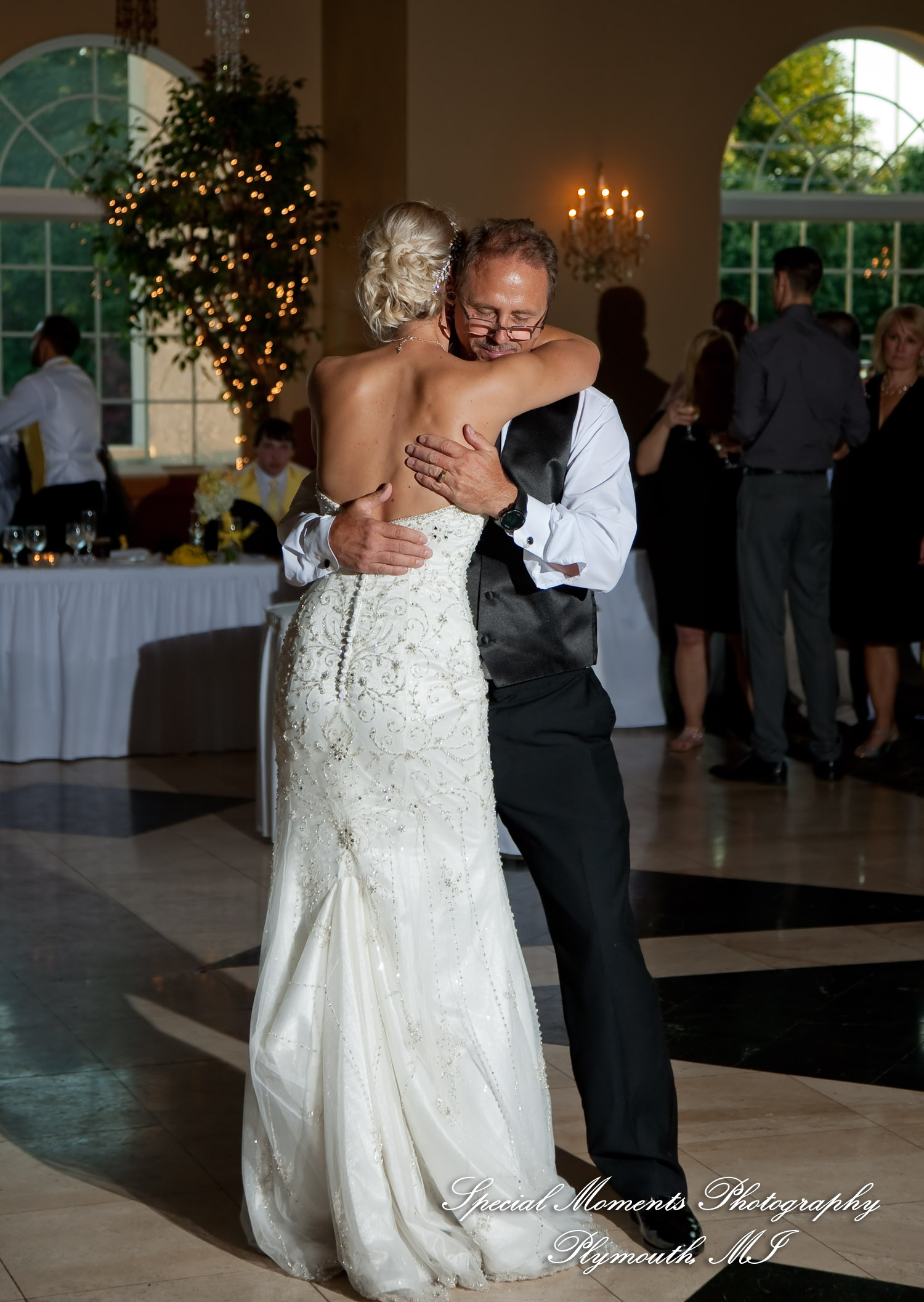 Kelly & Ryan at Italian American Club Livonia MI wedding photograph