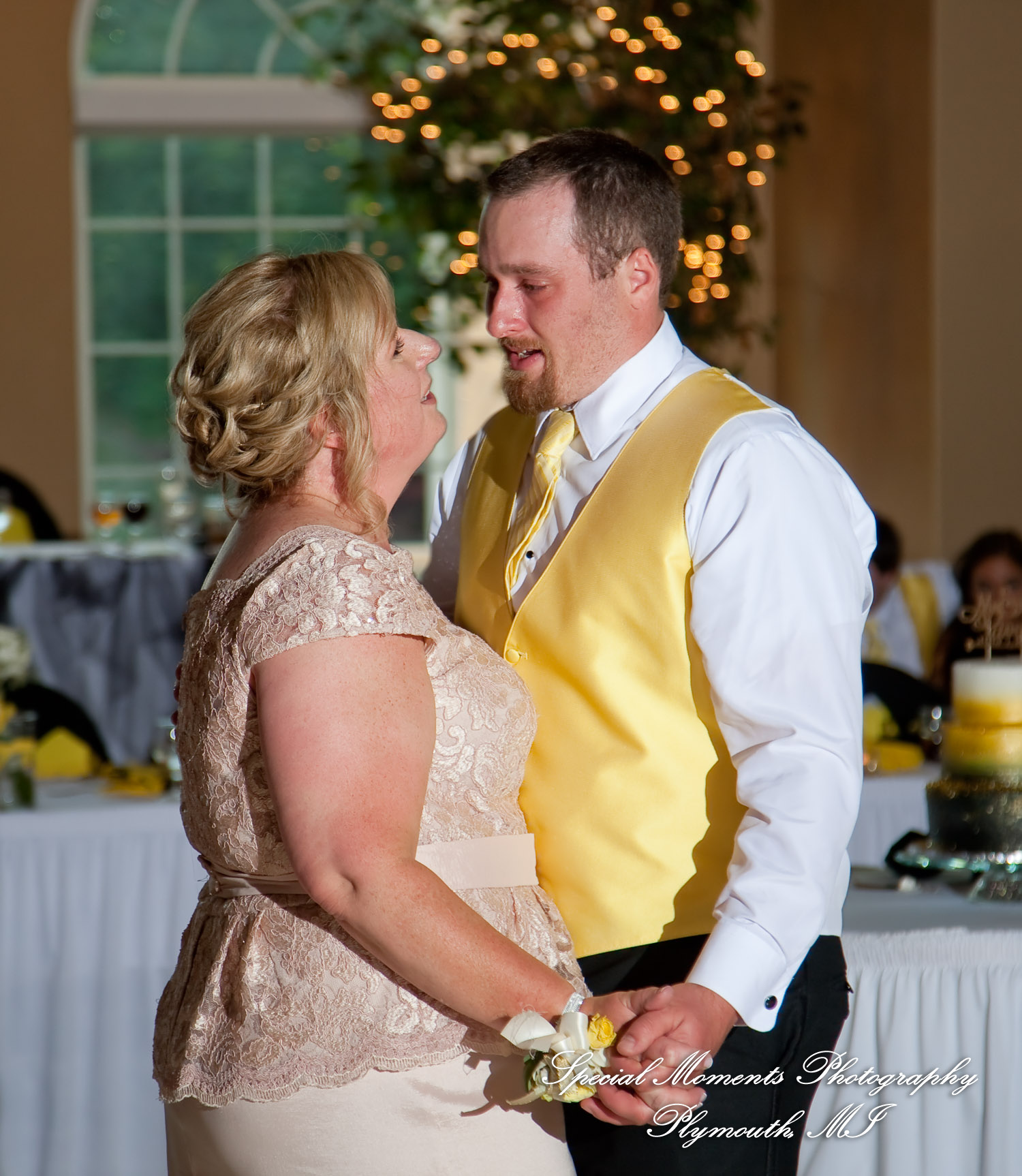 Kelly & Ryan at Italian American Club Livonia MI wedding photograph