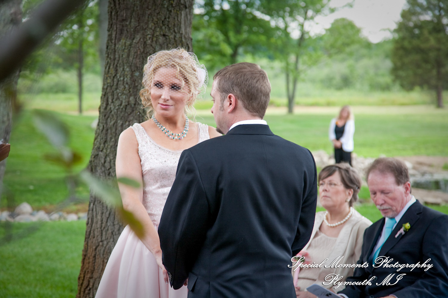 Erica & Jim at home wedding on the Lake in New Hudson MI wedding photograph