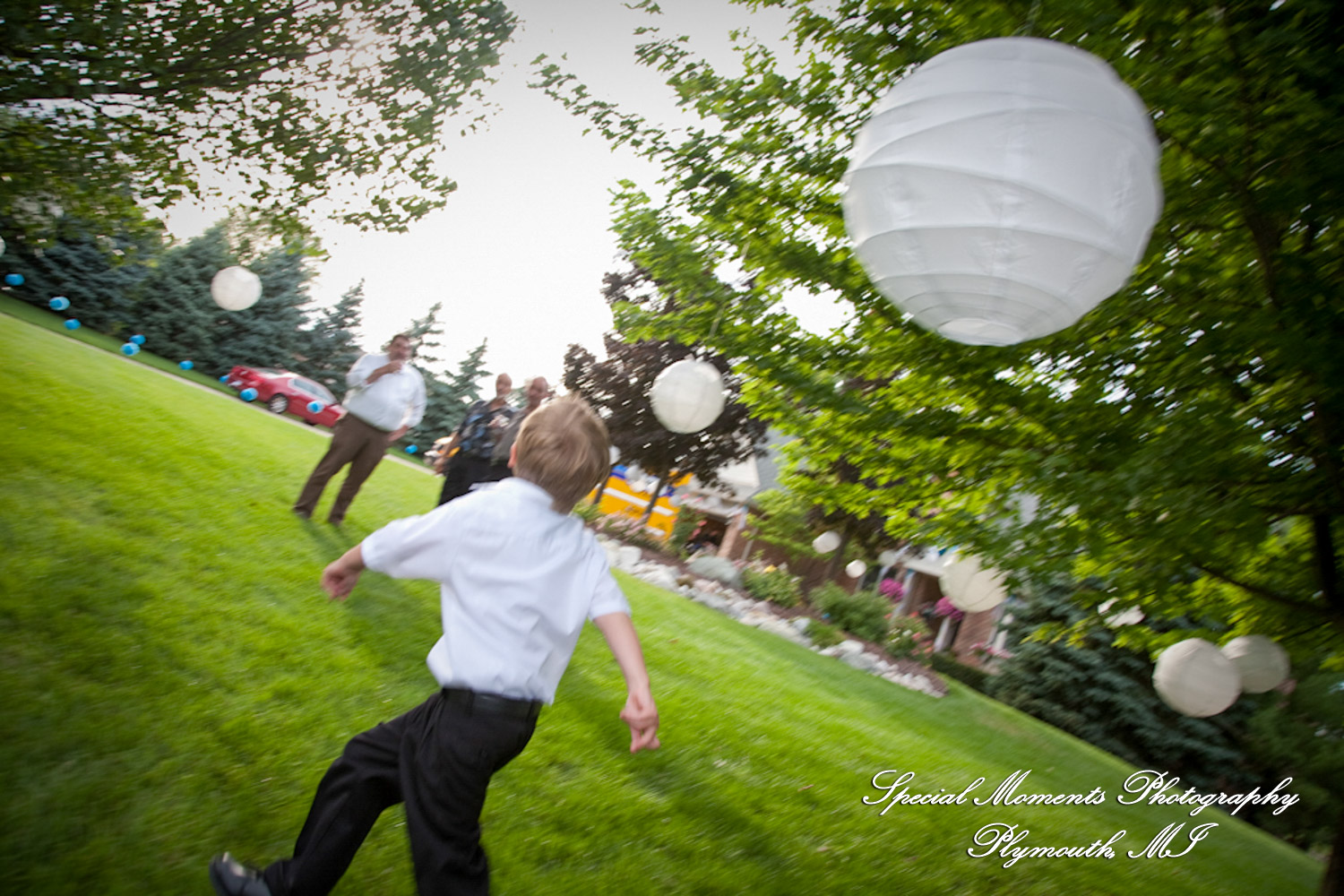 Erica & James at home backyard Tent Reception New Hudson MI wedding photograph