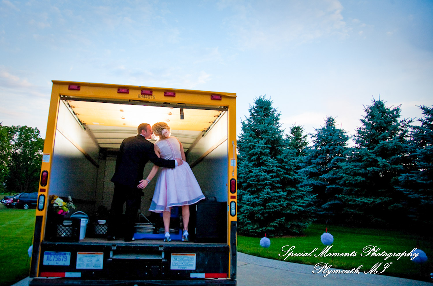 Erica & James at home backyard Tent Reception New Hudson MI wedding photograph