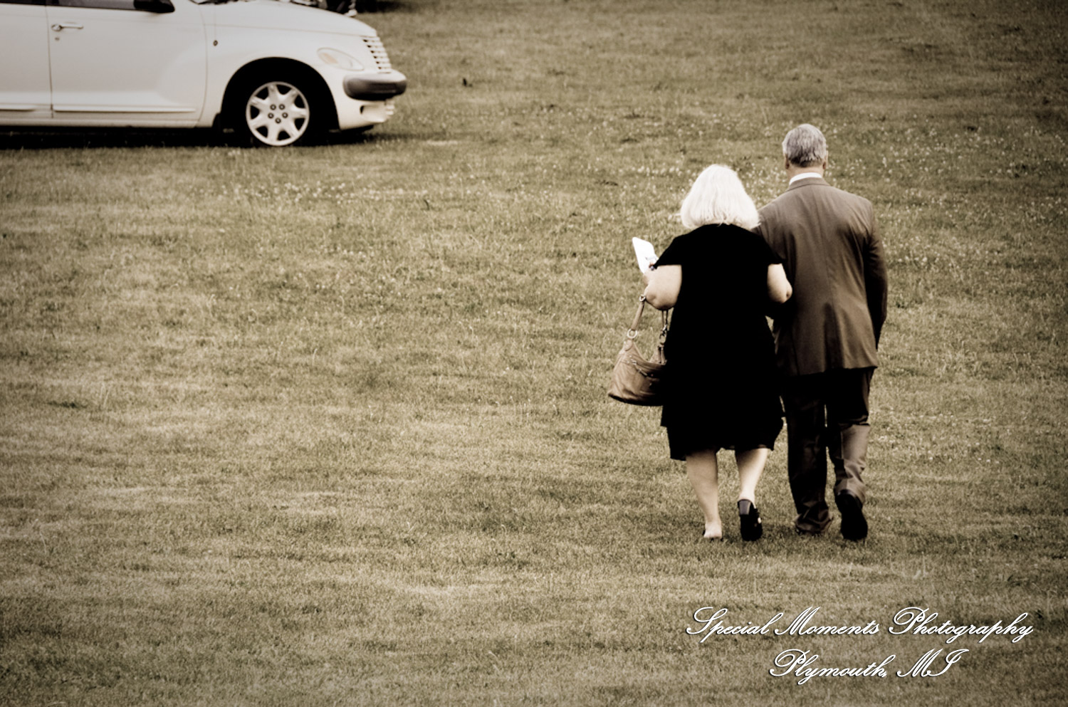 Erica & James at home backyard Tent Reception New Hudson MI wedding photograph