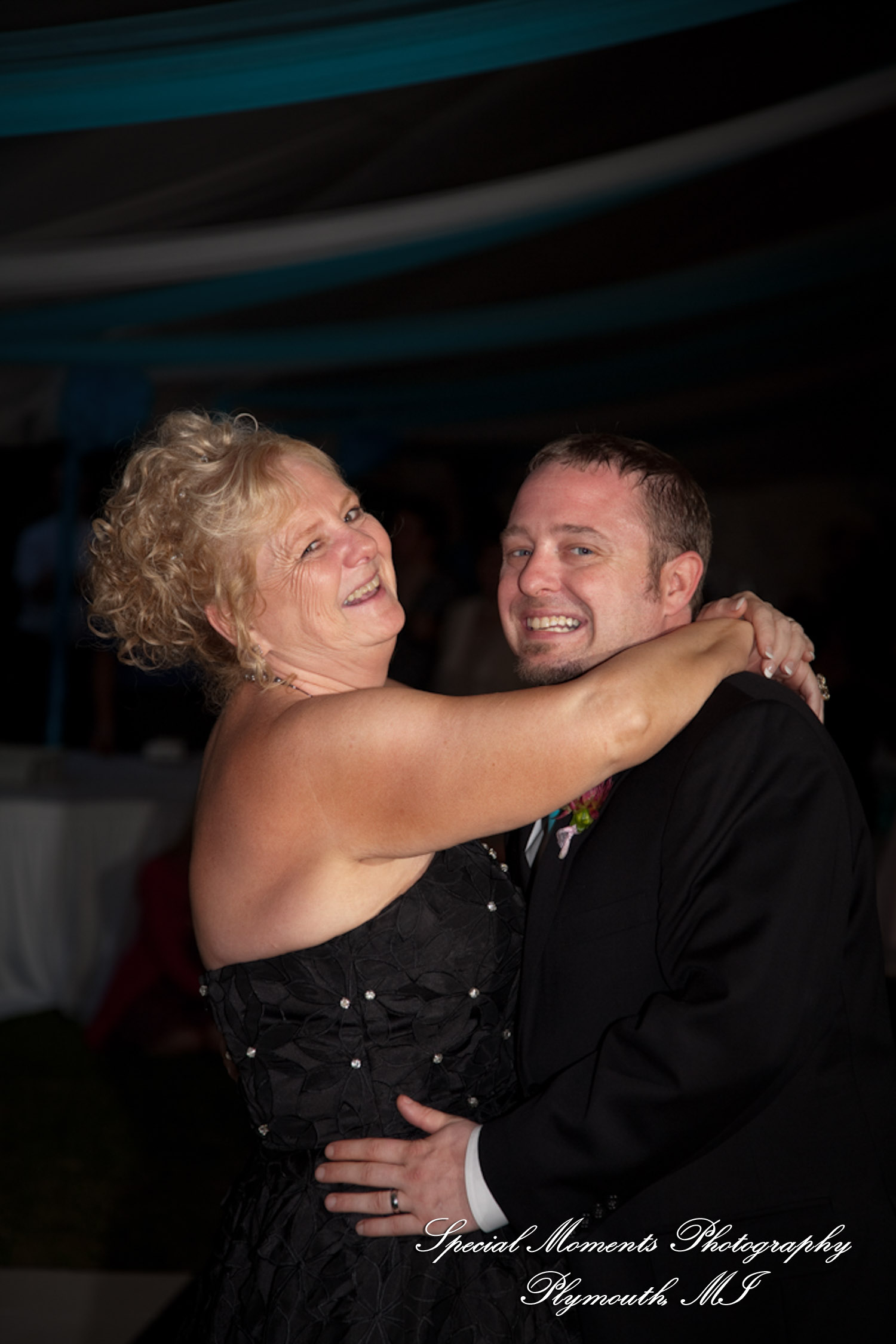 Erica & James at home backyard Tent Reception New Hudson MI wedding photograph