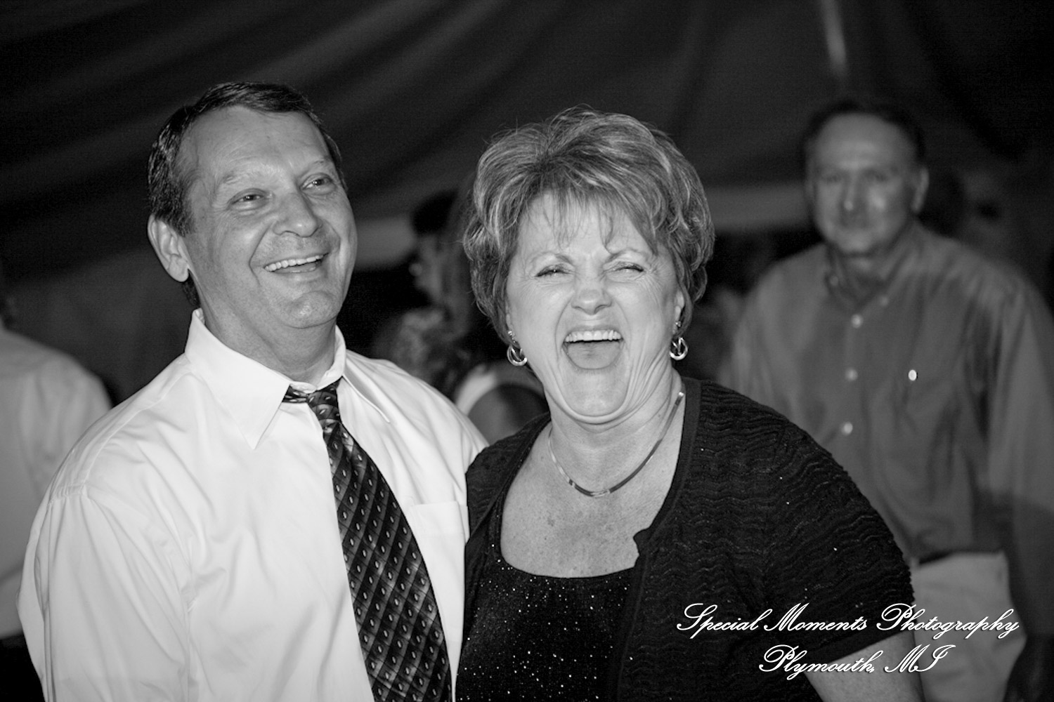 Erica & James at home backyard Tent Reception New Hudson MI wedding photograph