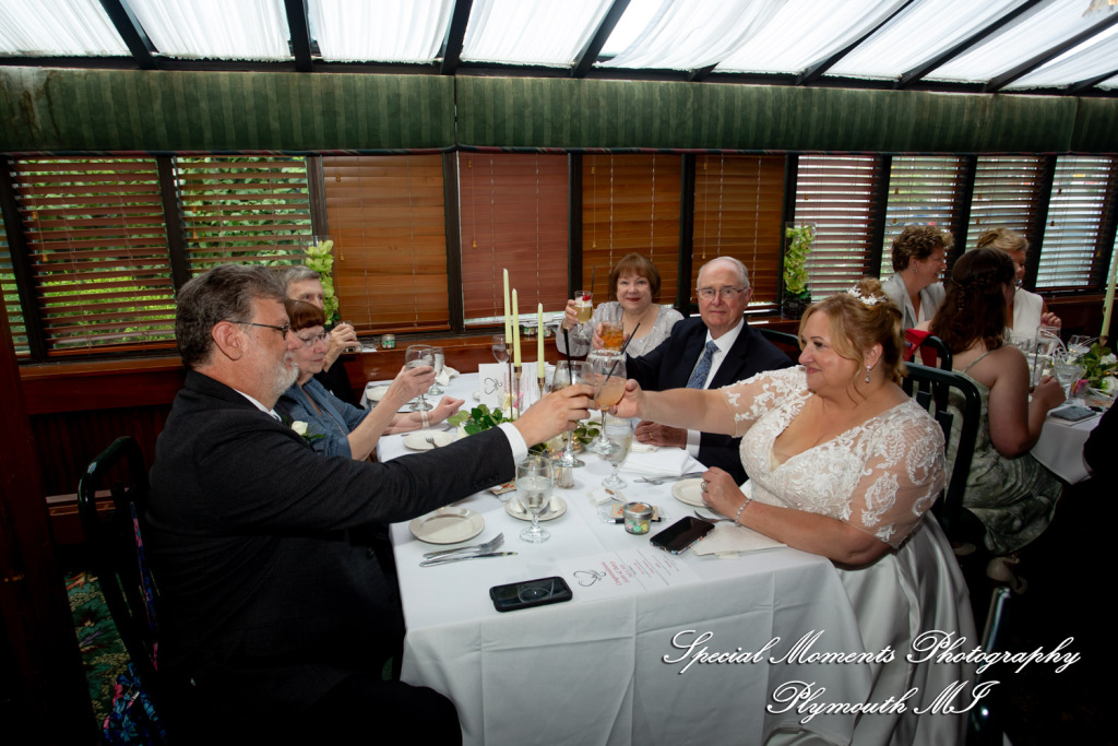 Darcy & Scott at The Masters Restaurant Madison Hts MI wedding photo