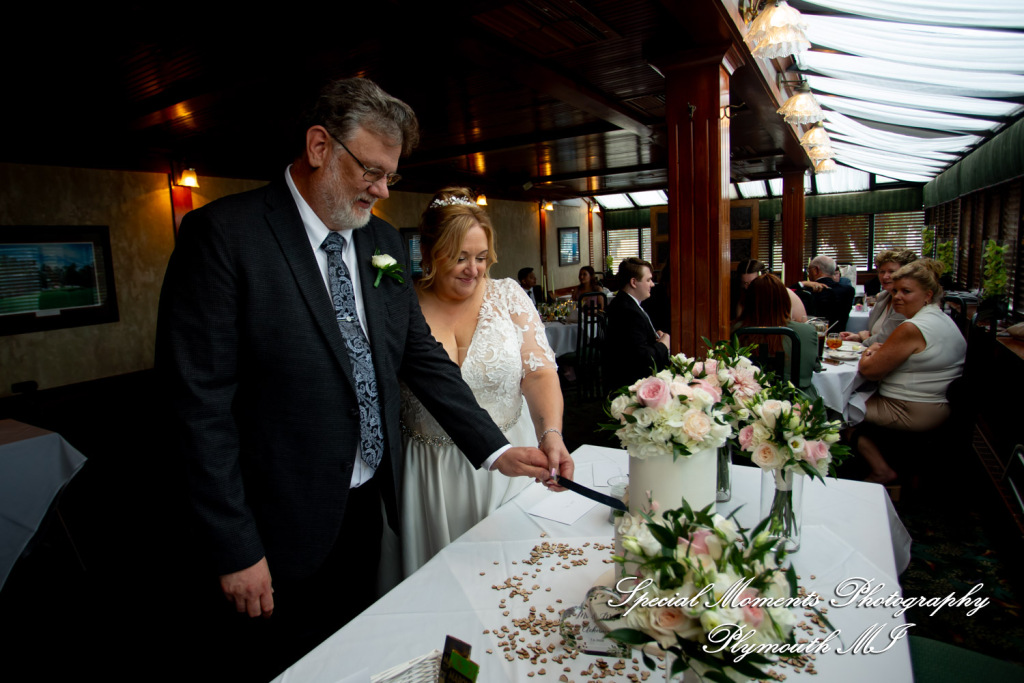 Darcy & Scott at The Masters Restaurant Madison Hts MI wedding photo