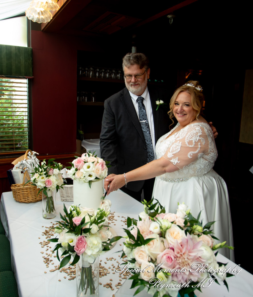 Darcy & Scott at The Masters Restaurant Madison Hts MI wedding photo