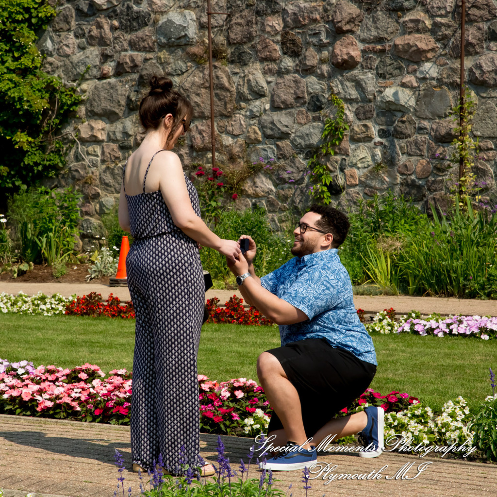 Candid surprise marriage proposal captured by Special Moments USA at the historic Cranbrook House and Gardens in Bloomfield Hills, Michigan. Candid surprise marriage proposal captured by Special Moments USA at the historic Cranbrook House and Gardens in Bloomfield Hills, Michigan.