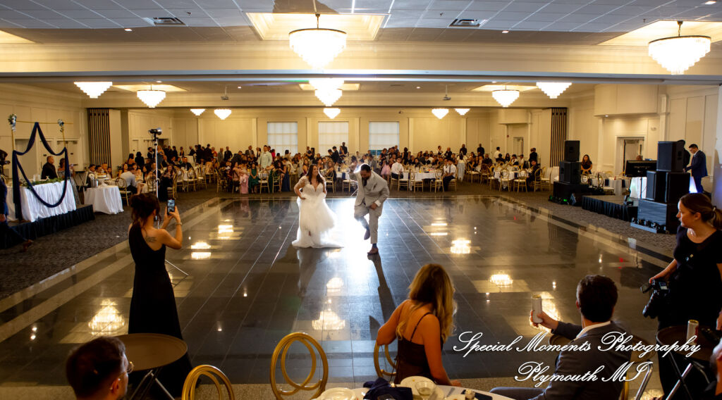 Gina & Jimmy: Elevated view of a bride and groom sharing their first dance in front of 450 guests at the Macedonian Cultural Center. Gina & Jimmy: Elevated view of a bride and groom sharing their first dance in front of 450 guests at the Macedonian Cultural Center.