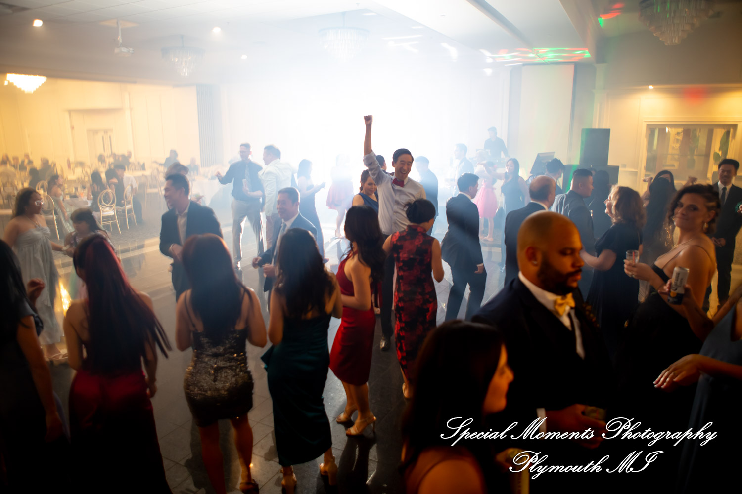 Jimmy & Gina High energy wedding reception celebration and packed dance floor at the Macedonian Cultural Center in Sterling Heights Michigan.