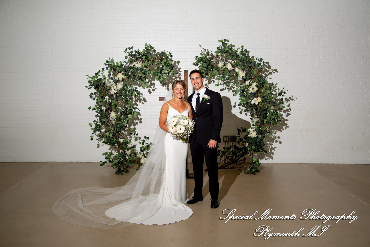 Ryli & Bennett at The Collins at the Clocktower Chelsea MI wedding photography