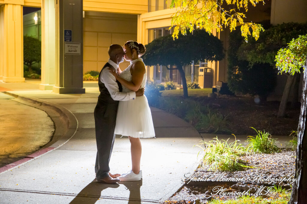 Late night outdoor wedding portrait of Tameka and James sculpted by custom supplemental lighting at the Troy Marriott. Late night outdoor wedding portrait of Tameka and James sculpted by custom supplemental lighting at the Troy Marriott.