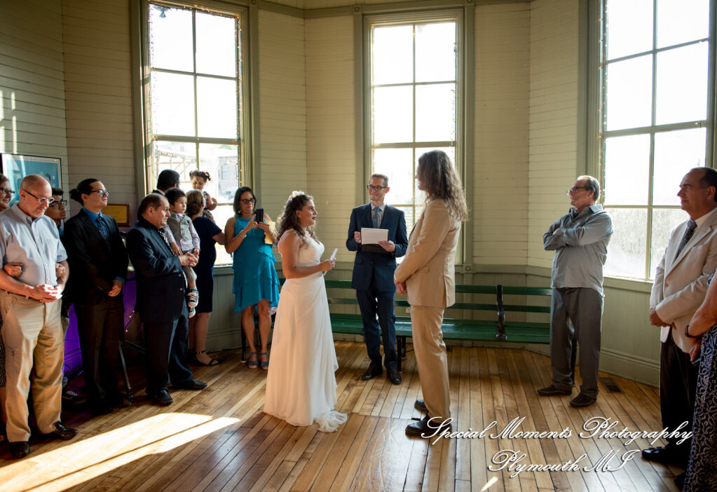 Lissy and Stephen exchange vows during their casual rustic wedding ceremony inside the historic Chelsea Train Depot in Chelsea MI. Lissy and Stephen exchange vows during their casual rustic wedding ceremony inside the historic Chelsea Train Depot in Chelsea MI.