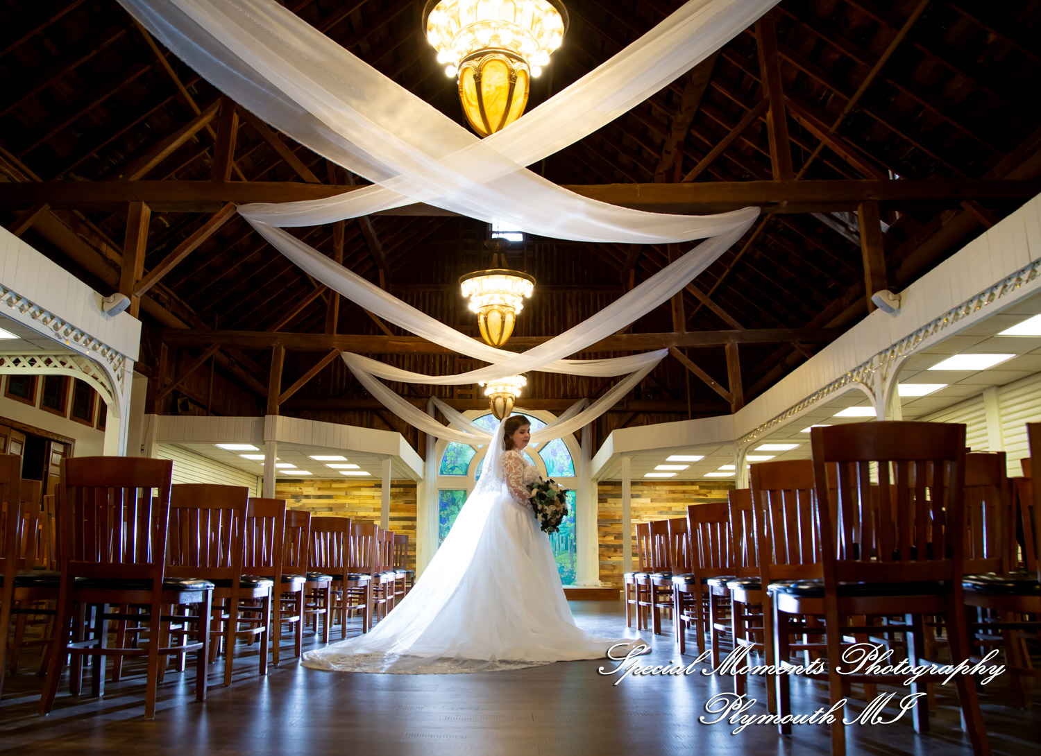 Bride Maureen shares a relaxed morning preparation moment inside the Chapel at Canterbury Castle in Lake Orion MI.